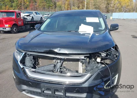 2015 Ford Edge Titanium z USA, uszkodzony, nr VIN 2FMTK4K94FBB52117